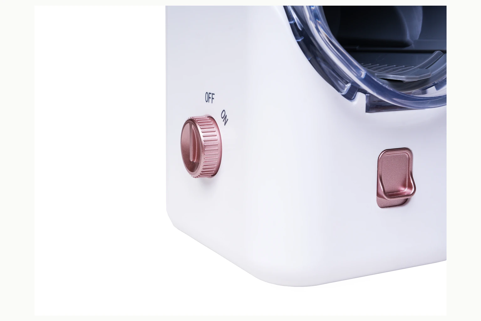 Close-up of the DL102 rose-gold rotary dial and safety-lock control
