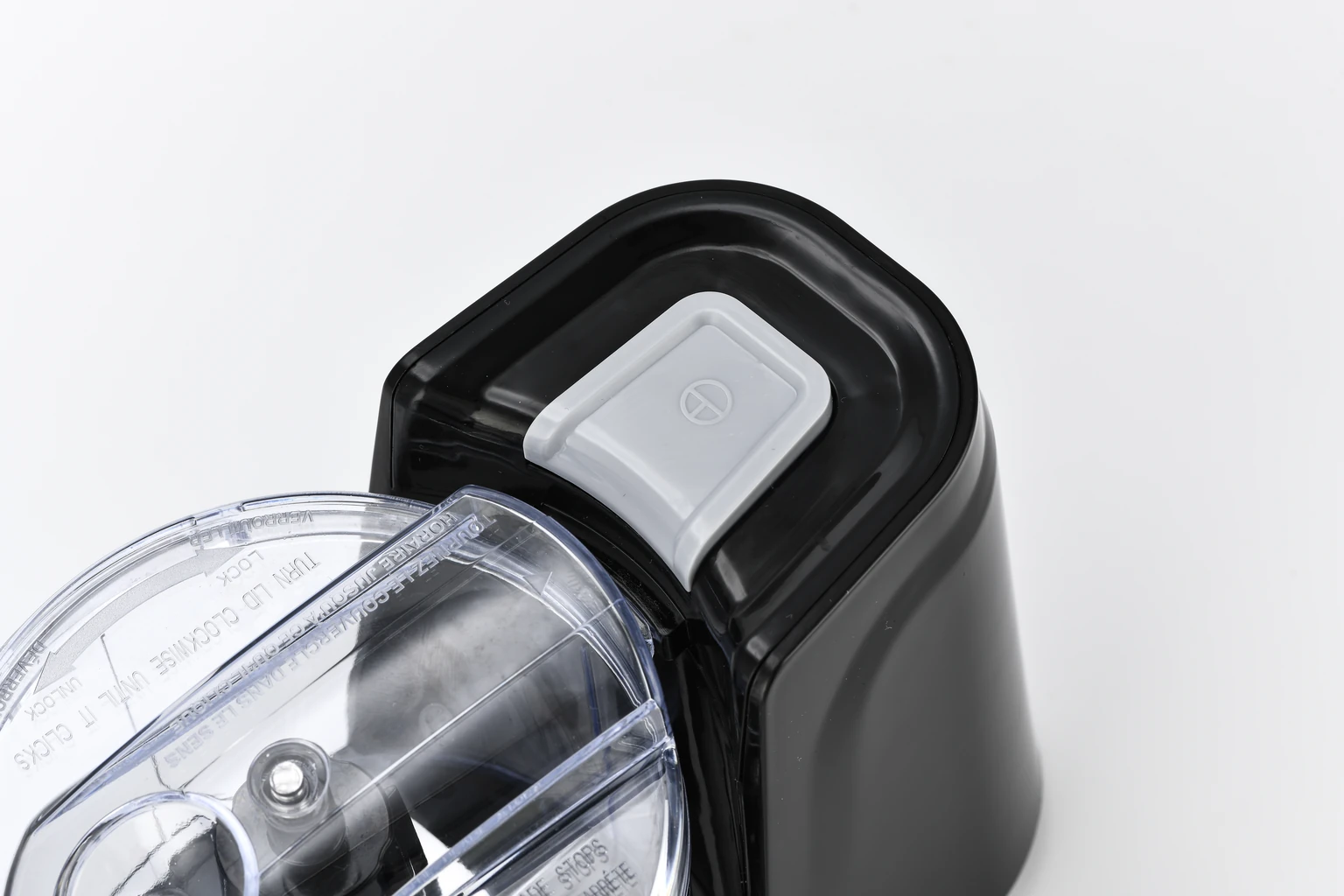 Close-up of the rectangular top push button on the Golden-Yee DL201 food chopper