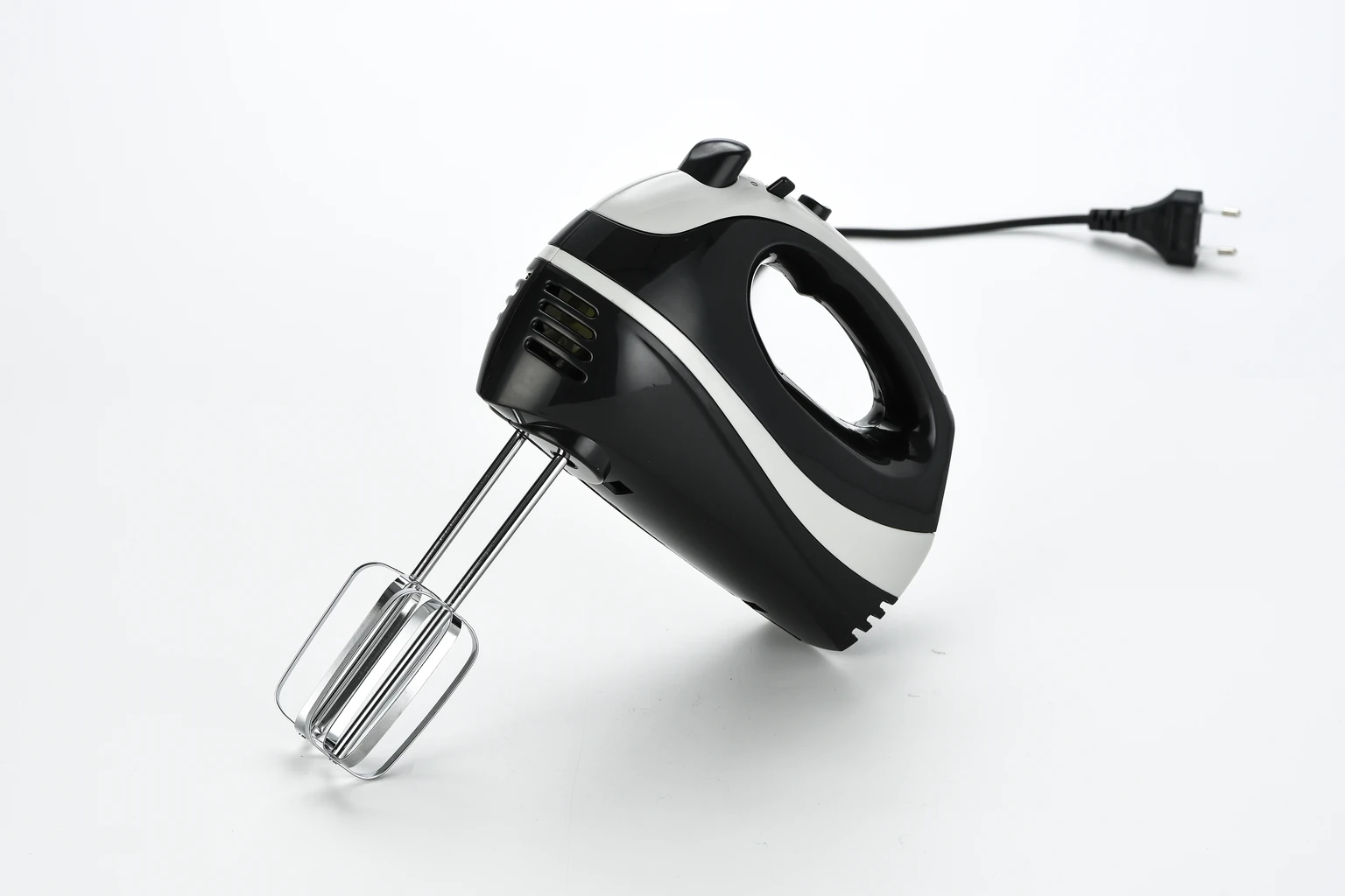 Verified side view of the GHM007 with twin beaters, housing vents and power cord