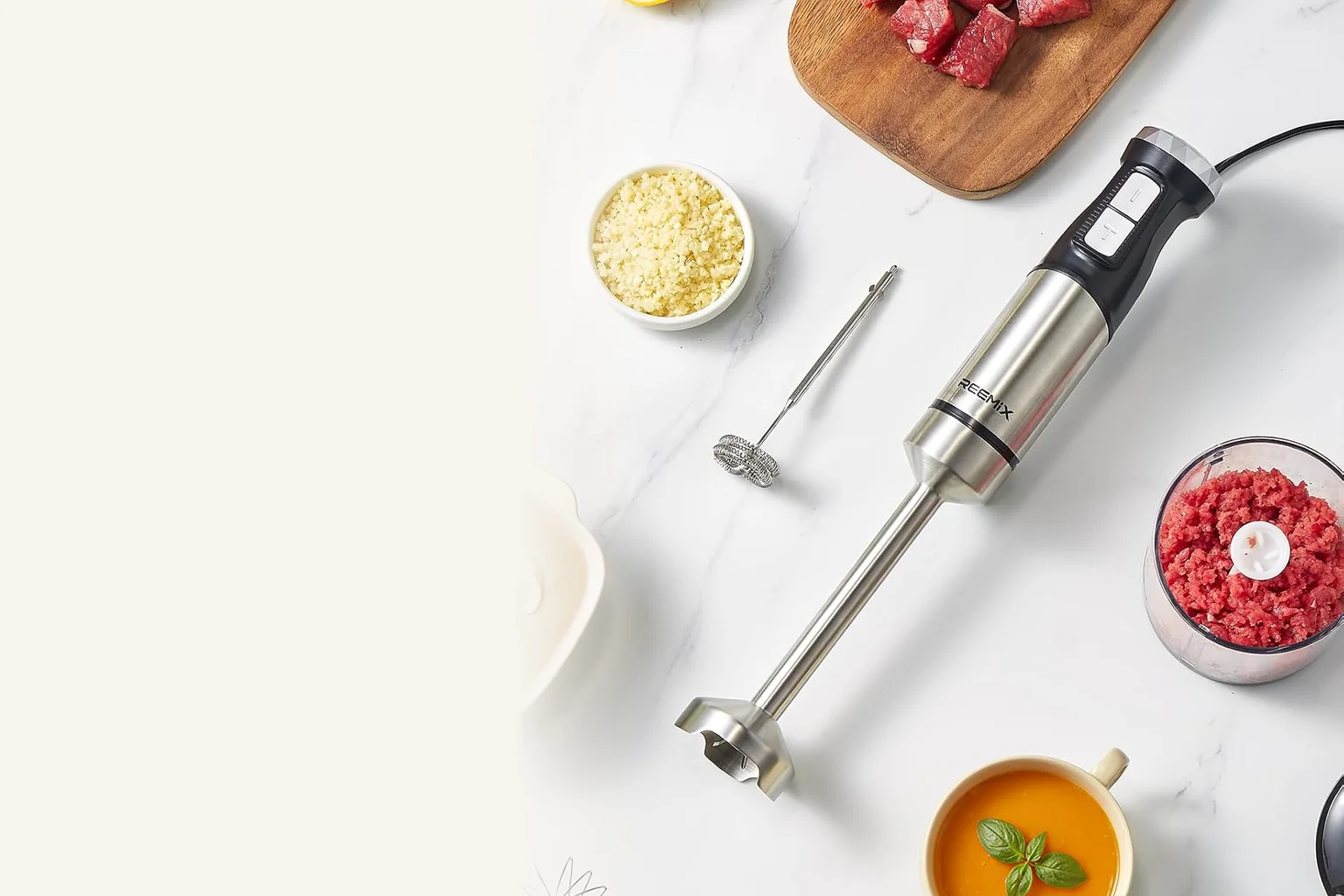 Customer retail reference of the PX8245 hand blender arranged with soup, chopped ingredients and a milk frother